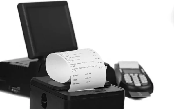 Cash register paper rolls in a retail setting